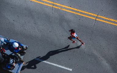 Woman Running a Marathon