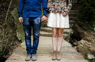 Couple Standing and  Holding Hands