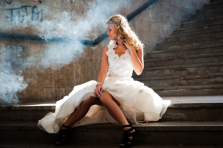 Woman Wearing White Wedding Dress Sitting on Stair