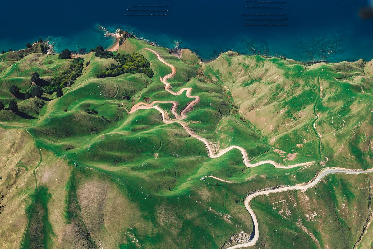 Free Photo Aerial View Curved Path Through The Hills