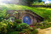 Live Like a Hobbit Small Cottage Surrounded by Greenery