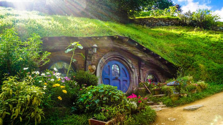 Live Like a Hobbit Small Cottage Surrounded by Greenery