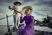 Asian Model in a Boat Wearing Conical Hat