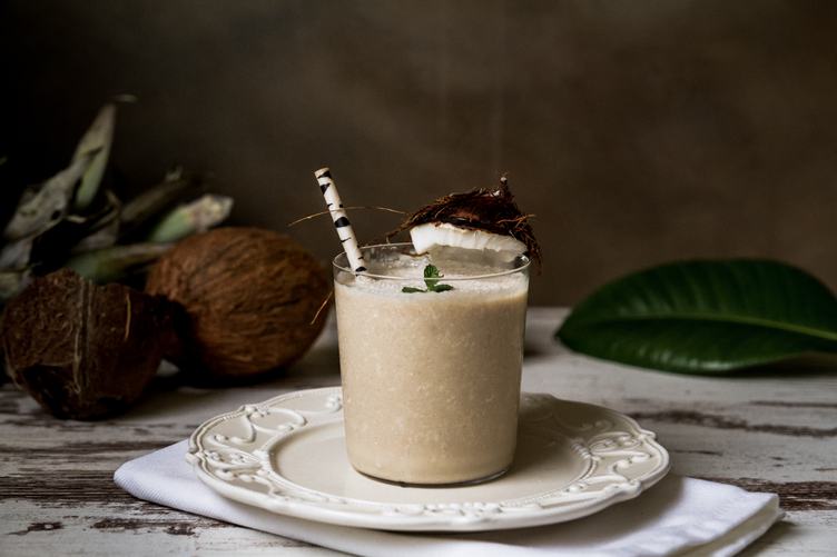Stylish Coconut Milk Beverage with a Straw