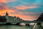 Evening View of a Parisian Bridge and Traffic Lanes along the Seine