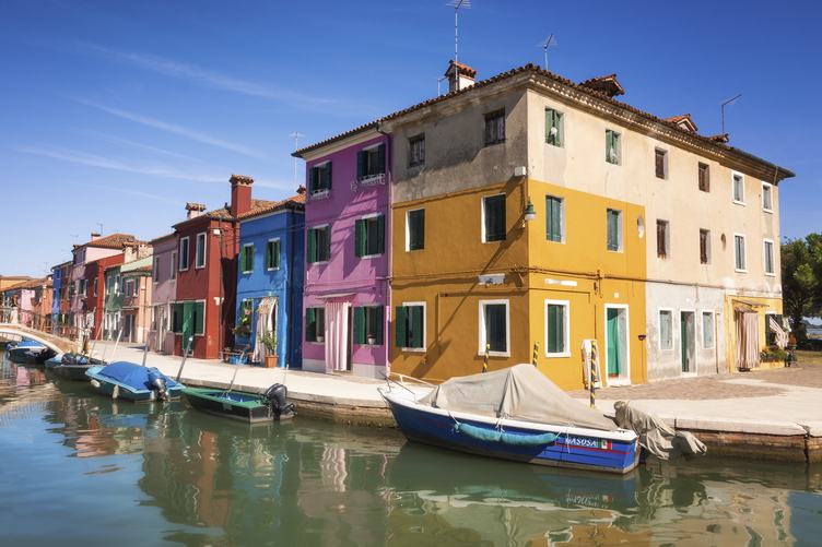 Colorful Houses and Boats along the Canal