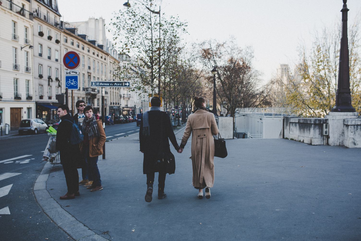 Elegant Couple Walking the Streets Holding Hands