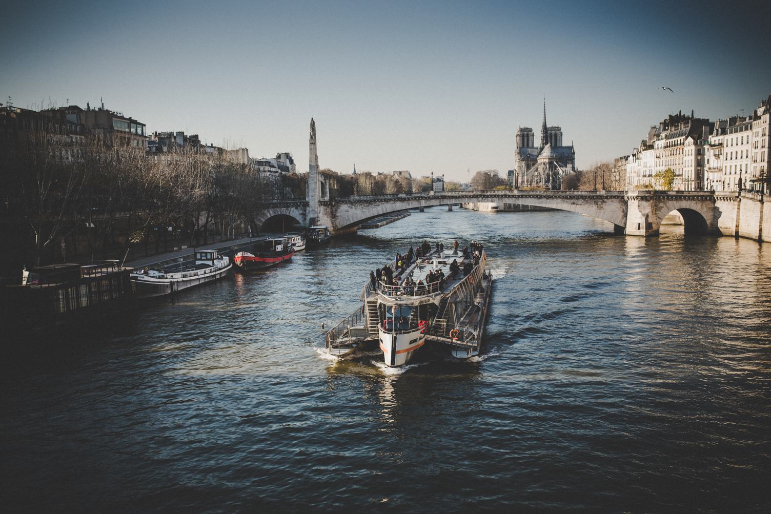 Tourist Barge on the River Seine near Notre-Dame