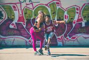 Couple Fit Young People Dancing in the Street
