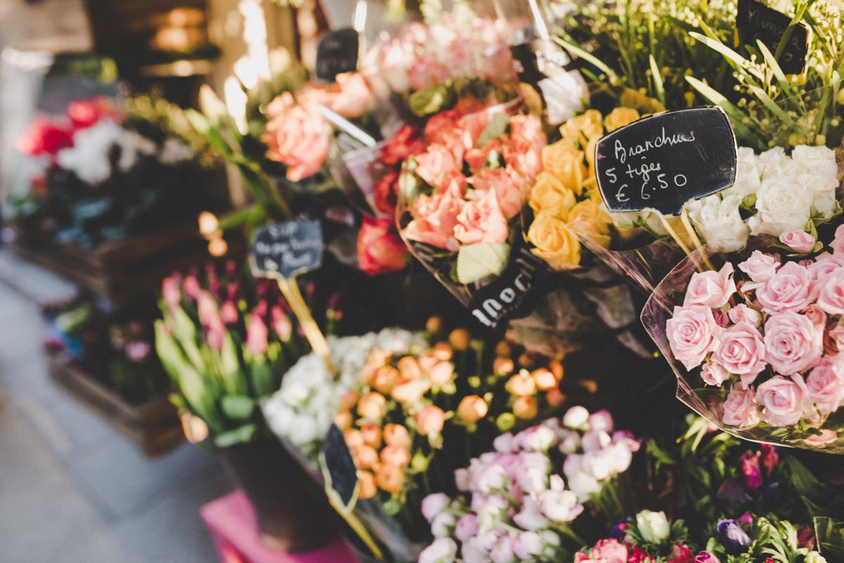 Free Photo Exterior Florist's Stall with Colorful Flowers