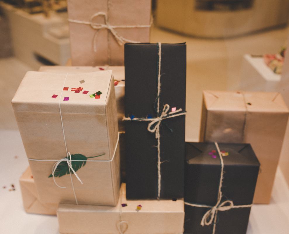 Free Photo Multiple Gifts Wrapped in Paper with Twine Ribbons