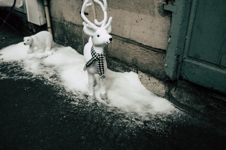 White Animals Toys on a Snow Street Christmas Decoration