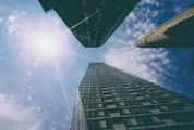 Look Up at Skyscrapers under the Sunny Sky