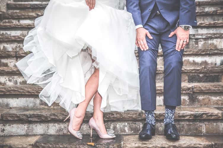 Legs of Bride and Groom on Stairs