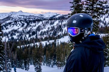 Portrait of Snowboarder in Helmet and Sunglass Mask