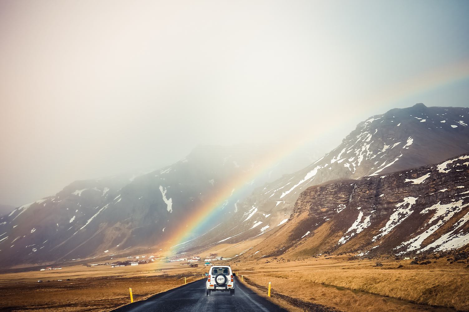 Beautiful Rainbow over Road and Mountain