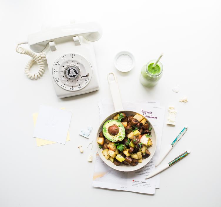 Food and Old Phone on White Table