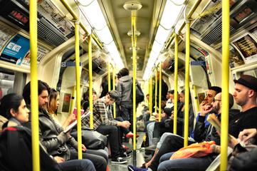 Passengers Sitting in the Subway Wagon
