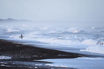 Surfer Enjoy Big Wave and Foam