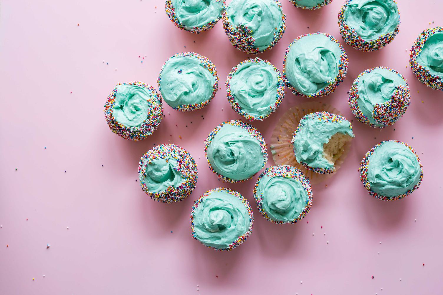 Cupcake with Mint Cream on Pink Background