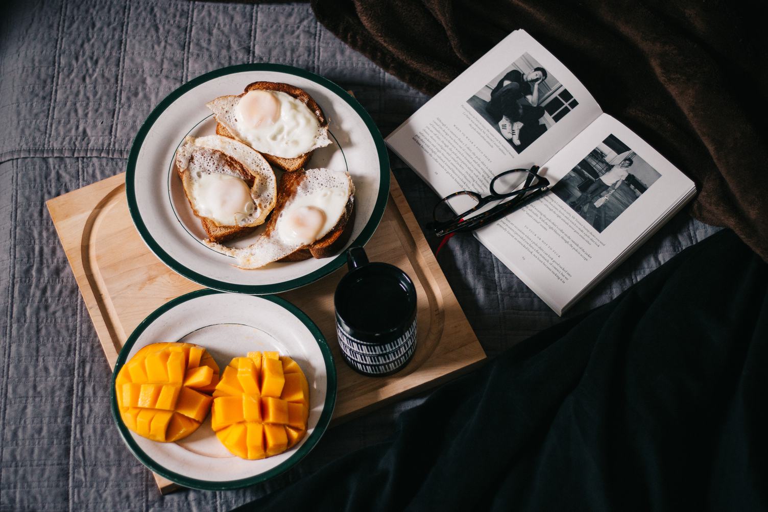 Book and Breakfast on the Wood Tray in Bed