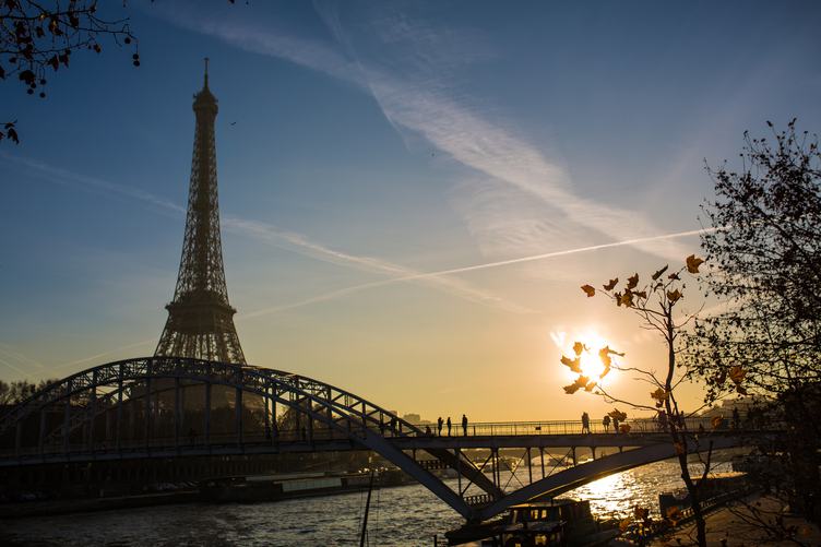 Sunset over Seine in Paris with Eiffel Tower in Autumn Time