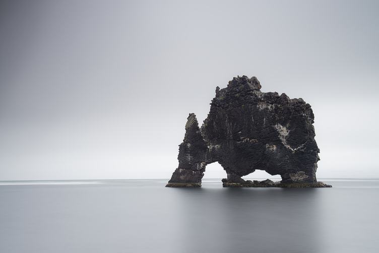 Gray Calm Sea and Island Geology Rock Formation
