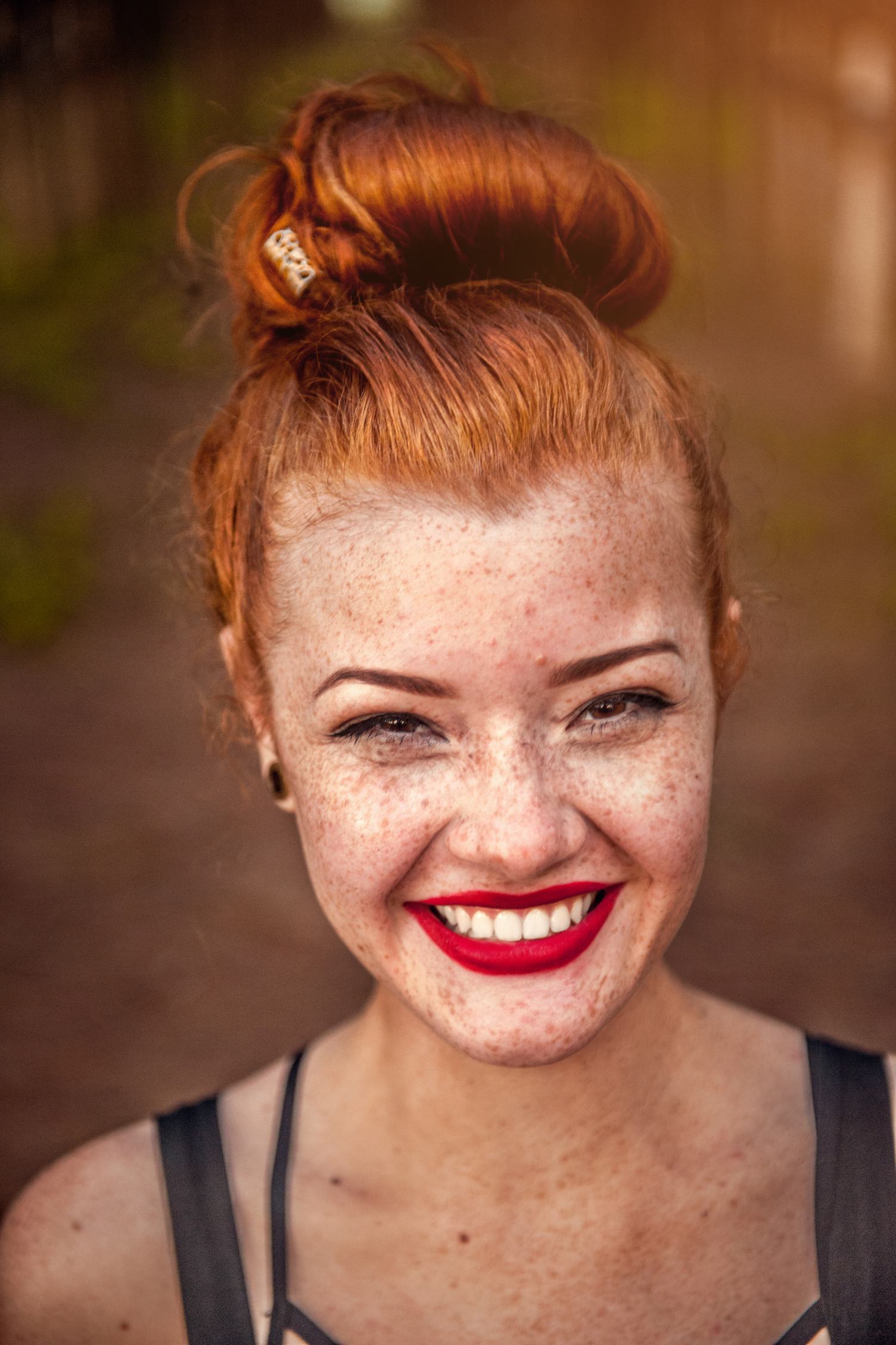 Closeup Portrait of Redhead Girl with Brown Eyes and Freckles, Natural Beauty