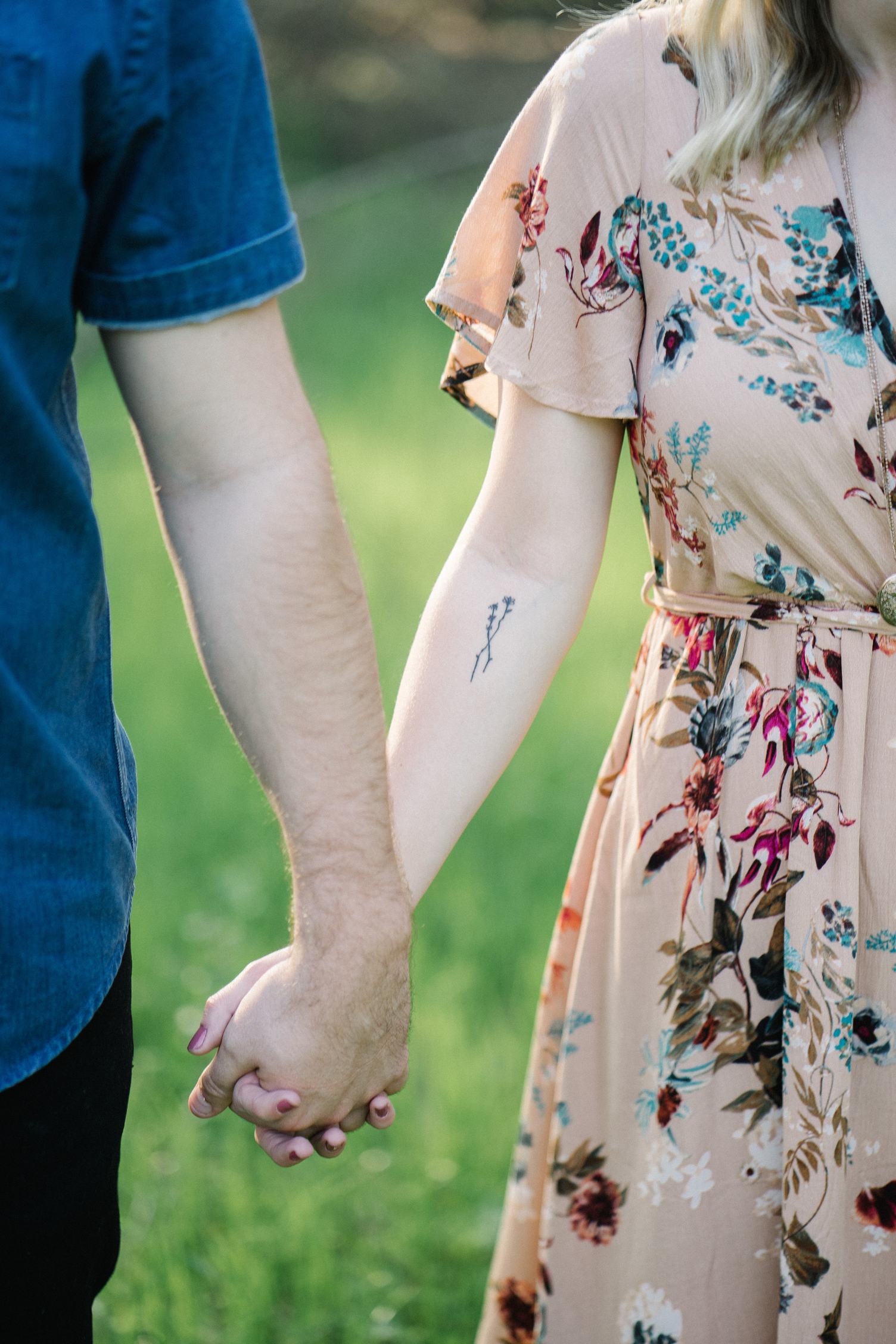 Closeup of Cute Couple Holding Hands While Walking