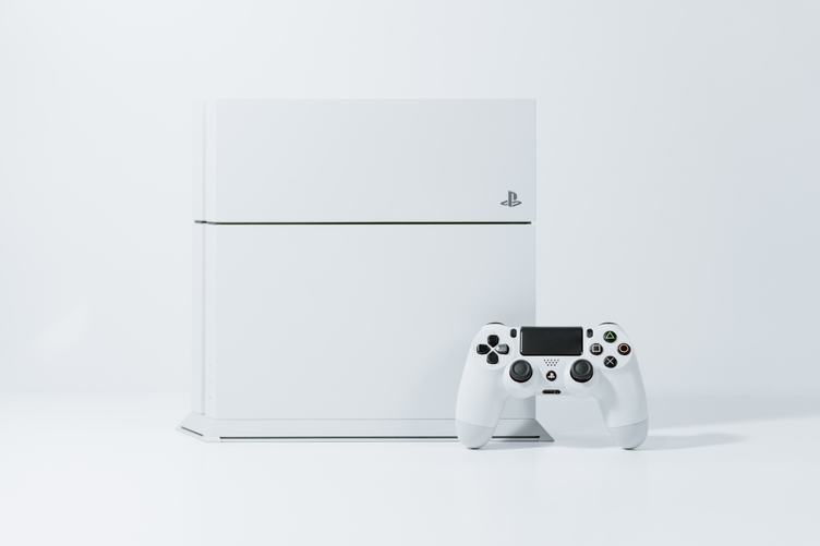 White PS4 Videogame Console and Game Controller