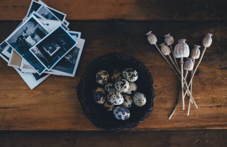 Quail Eggs in a Bowl on a Wooden Background