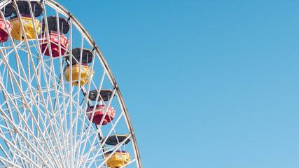 Ferris Wheel over Blue Sky