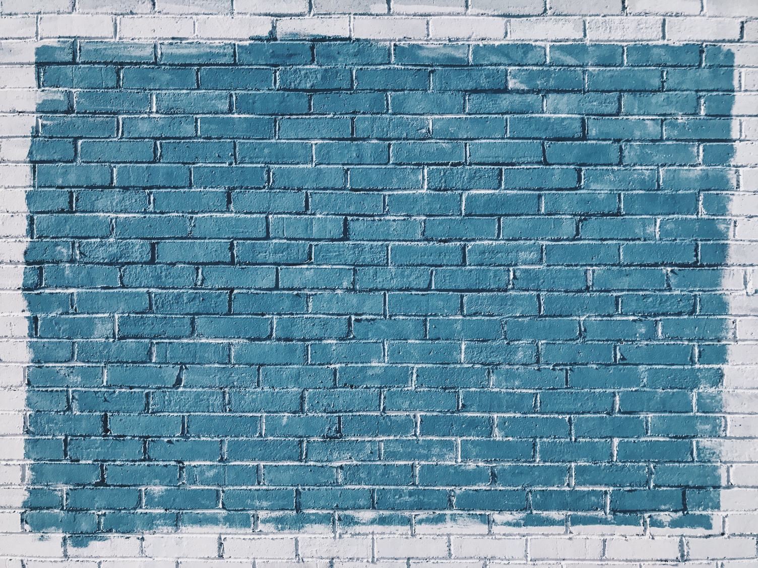 The Brick Wall Painted in Blue