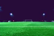 Empty Night Football Field in the Lights