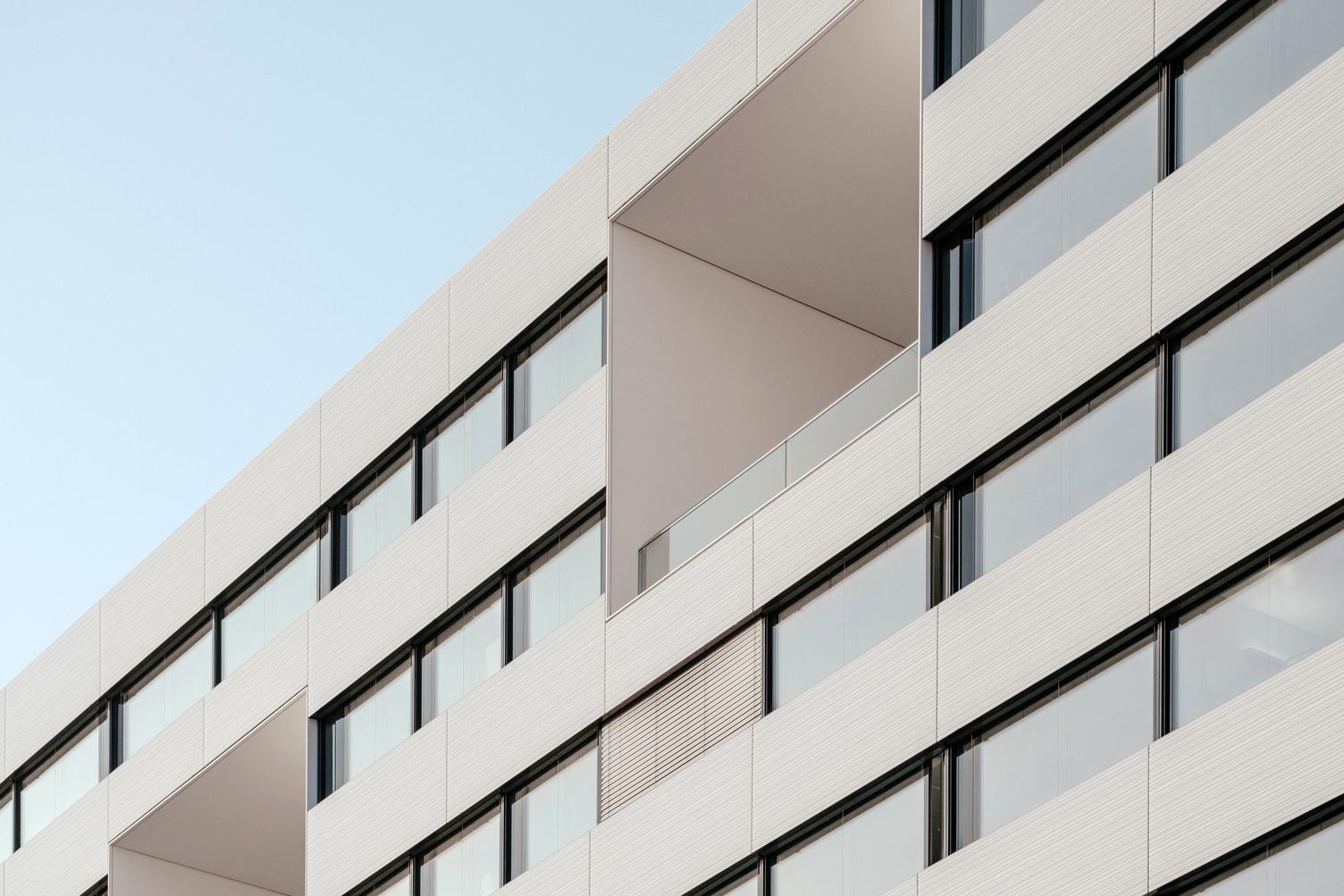 Modern Office Building White Facade with Windows