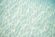 Light Blue Rippled Sand under Water Texture