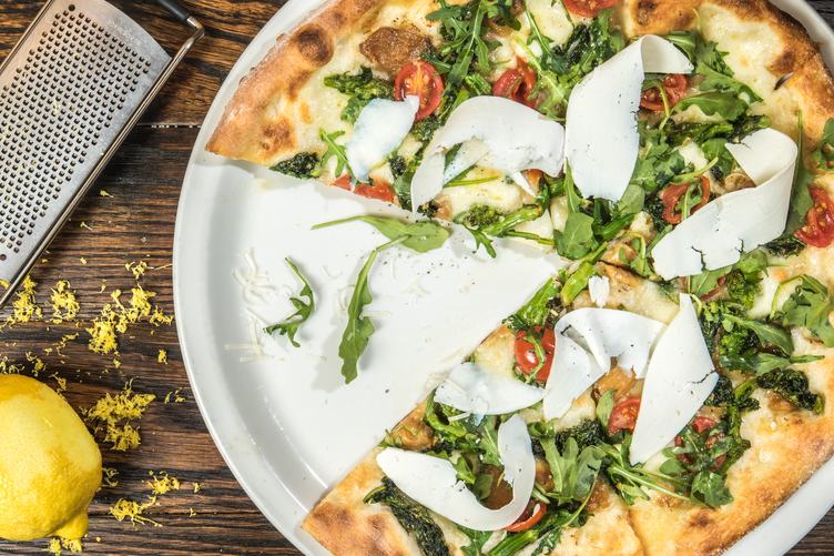 Fresh Baked Pizza with Tomatoes and Rucola