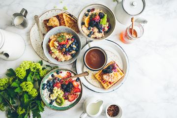 Delicious Breakfast Bowls with Fruits Top View