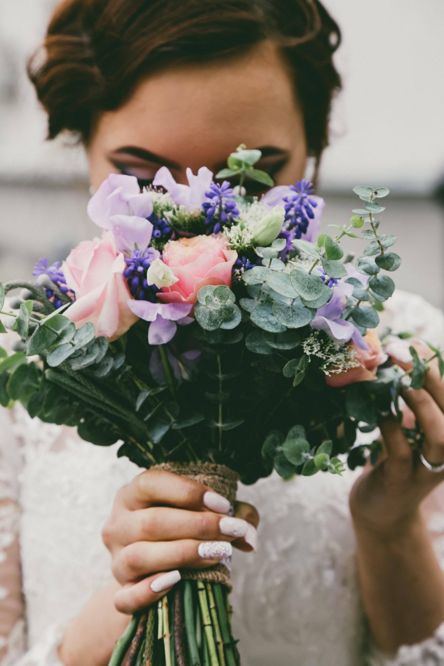 Nice Colorful Wedding Bouquet in Bride's Hand