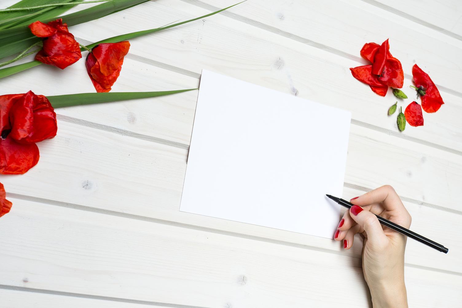 Woman Writing Wishes on the Blank Card