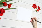 Woman Writing Wishes on the Blank Card