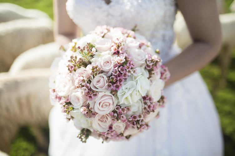 Beautiful Wedding Bouquet in Bride's Hands