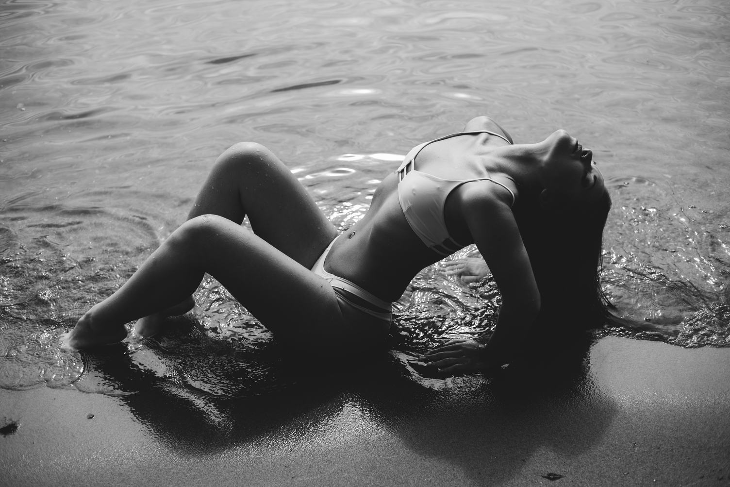 Sexy Young Woman Posing on Beach