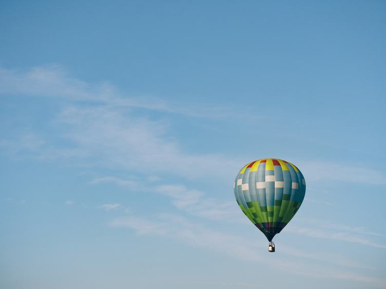 Colorful Hot-Air Balloon against Blue Sky