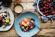 Sweet Breakfast Toast with Fruits on Wooden Table