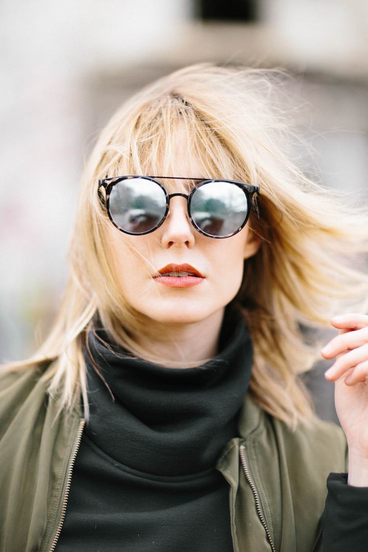 Portrait of Young Beautiful Blonde Girl in Sunglasses