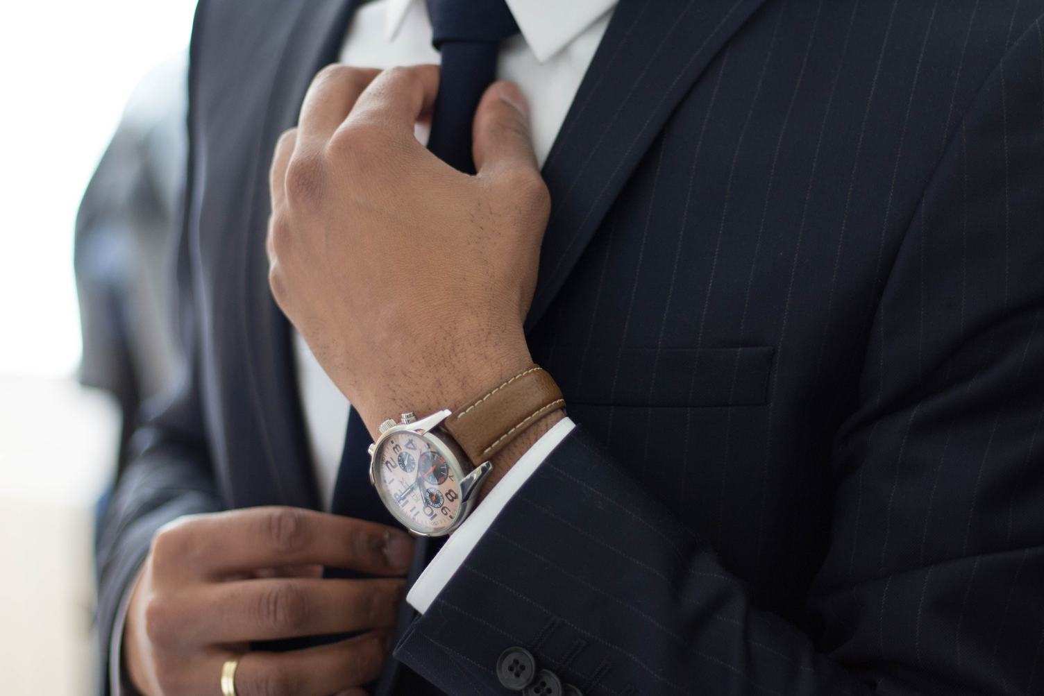 Businessman Adjust Necktie His Suit