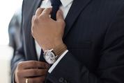 Businessman Adjust Necktie His Suit