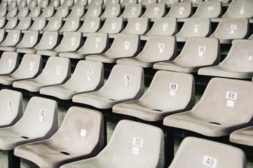 Numbered Gray Seats in a Stadium