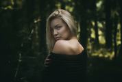 Sensual Portrait of Beautiful Young Woman in Forest